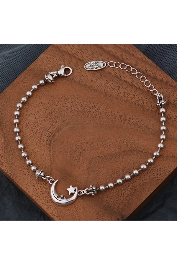 Celestial Moon & Star Silver Bracelet: Perfect for Concert & Date Night Outfits