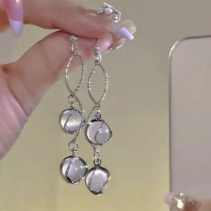 Crystal Twirl Drop Earrings: Perfect for Concerts, Date Nights