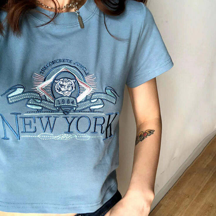 NY Embroidered Tee: Trendy Outfit Ideas for Casual & Concert Looks